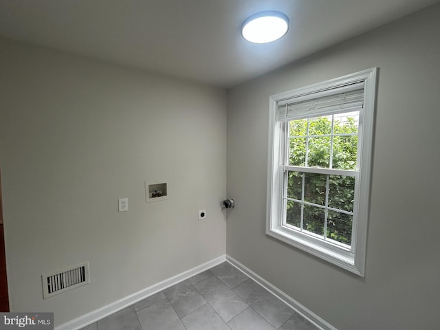 147 W Broad St, Telford, PA 18969 - washroom featuring hookup for a washing machine, electric dryer hookup, baseboards, and tile patterned floors