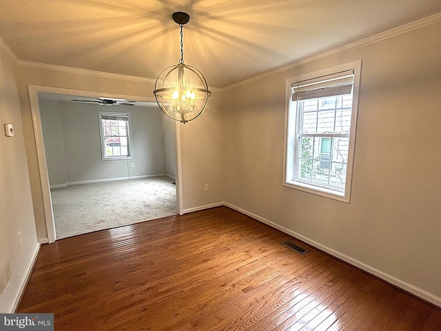 147 W Broad St, Telford, PA 18969 - empty room featuring hardwood / wood-style floors, a chandelier, crown molding, and baseboards