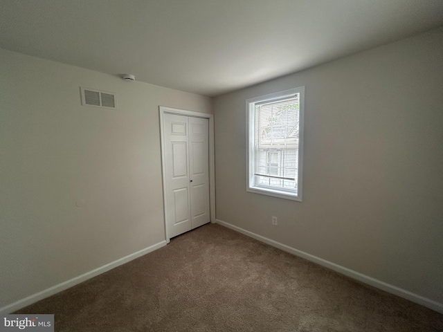 147 W Broad St, Telford, PA 18969 - unfurnished bedroom with carpet floors, baseboards, and a closet