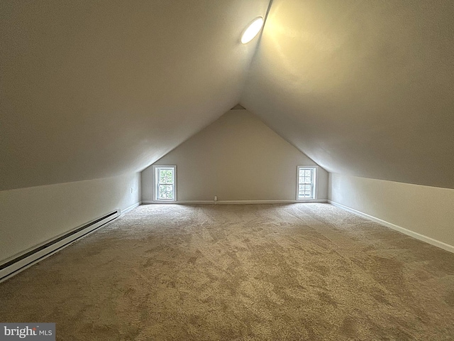 147 W Broad St, Telford, PA 18969 - additional living space featuring lofted ceiling, carpet flooring, a baseboard heating unit, plenty of natural light, and baseboards