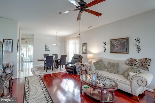 4 Montclair Ave, Berlin, NJ 08009 - living room featuring ceiling fan, wood finished floors, a chandelier, and baseboards