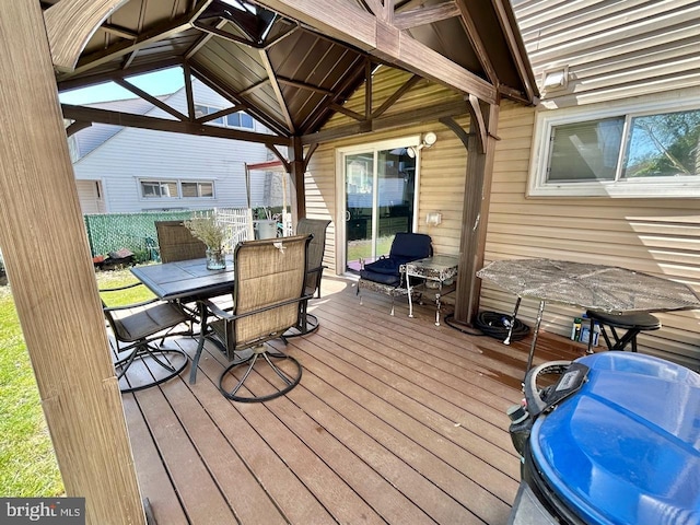 2817 Comly Rd, Philadelphia, PA 19154 - deck with outdoor dining area, fence, and a gazebo