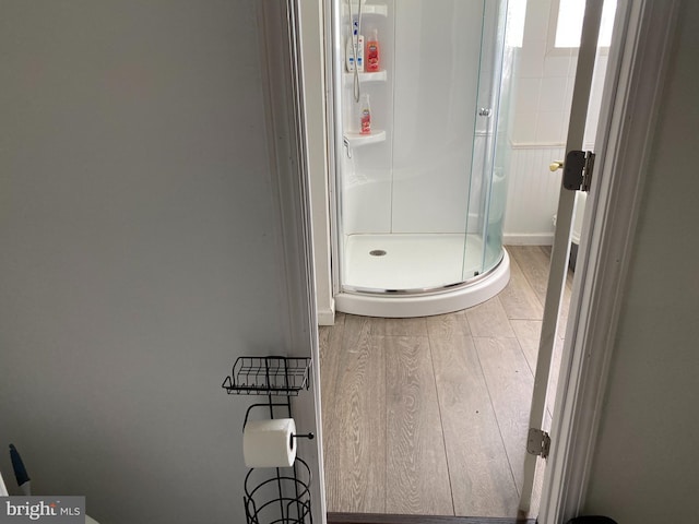 5110 Berclair Plantation Ln, Fredericksburg, VA 22408 - bathroom featuring wood finished floors and a stall shower