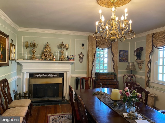 5110 Berclair Plantation Ln, Fredericksburg, VA 22408 - dining space with a fireplace, a chandelier, crown molding, and wood finished floors