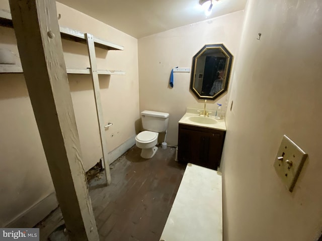 5110 Berclair Plantation Ln, Fredericksburg, VA 22408 - half bathroom with toilet, wood finished floors, and vanity