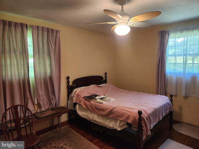 bedroom featuring wood finished floors and ceiling fan