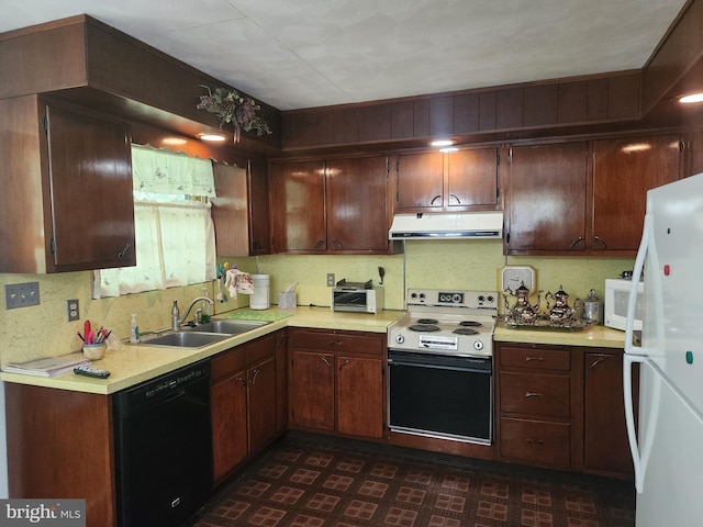 kitchen featuring white appliances, a sink, extractor fan, light countertops, and backsplash