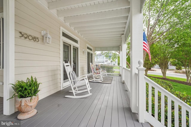 deck with covered porch