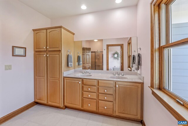 6670 Scottsville Rd, Scottsville, VA 24590 - full bath featuring baseboards, a stall shower, double vanity, tile patterned flooring, and recessed lighting