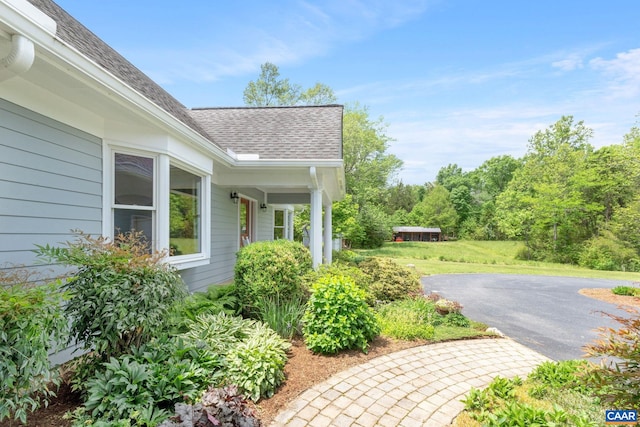6670 Scottsville Rd, Scottsville, VA 24590 - view of property exterior featuring roof with shingles