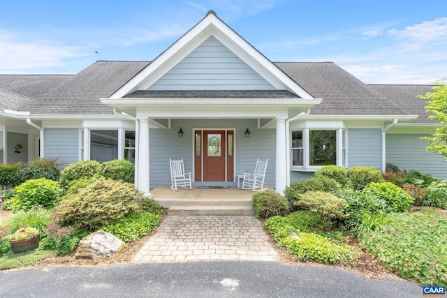 6670 Scottsville Rd, Scottsville, VA 24590 - view of front of home with covered porch and a shingled roof