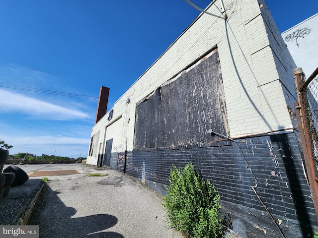 2127 Edmondson Ave, Baltimore, MD 21223 - view of side of property featuring brick siding