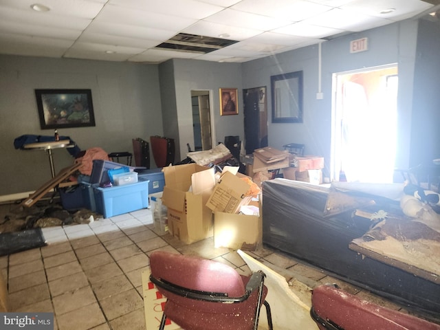 2127 Edmondson Ave, Baltimore, MD 21223 - below grade area with tile patterned floors and a drop ceiling