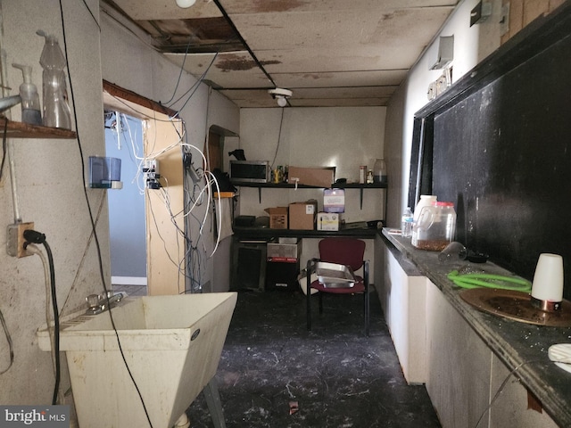 2127 Edmondson Ave, Baltimore, MD 21223 - basement featuring a sink