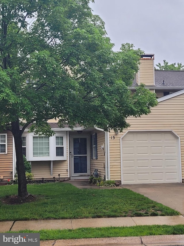 13 Amherst Ct, Bordentown, NJ 08505 - obstructed view of property with concrete driveway and a front lawn