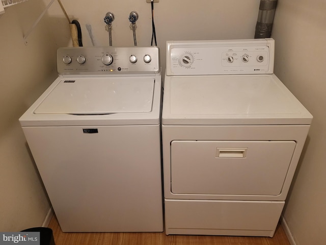 13 Amherst Ct, Bordentown, NJ 08505 - washroom featuring washing machine and clothes dryer and wood finished floors
