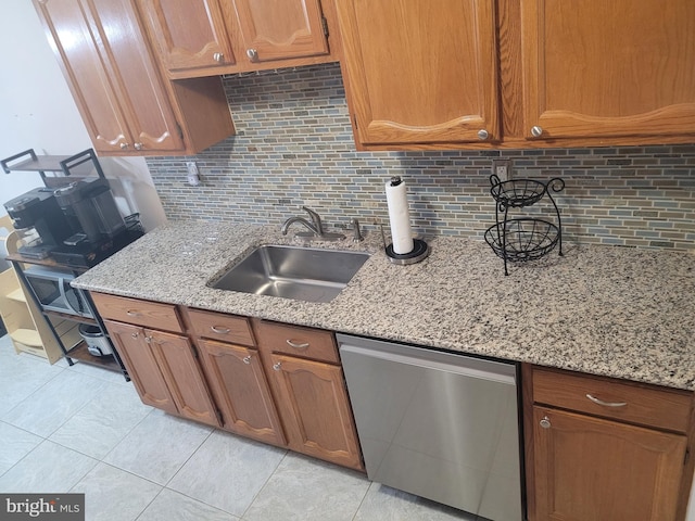 13 Amherst Ct, Bordentown, NJ 08505 - kitchen with stainless steel dishwasher, a sink, tasteful backsplash, and light tile patterned flooring