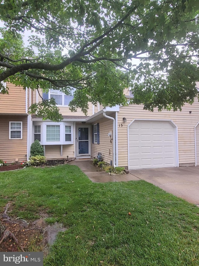 13 Amherst Ct, Bordentown, NJ 08505 - view of front of property featuring a front yard, concrete driveway, and an attached garage