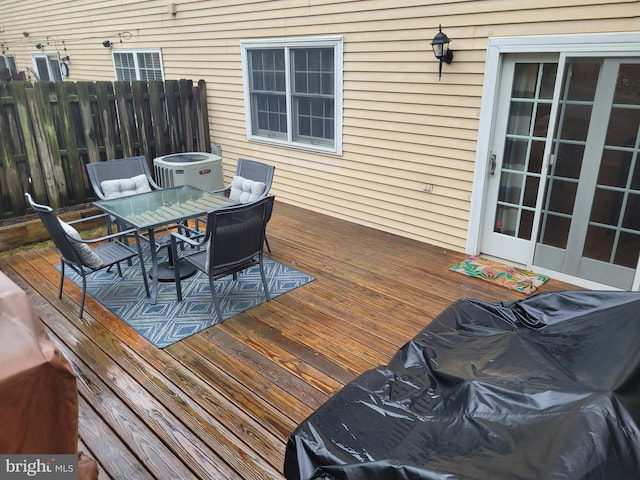 13 Amherst Ct, Bordentown, NJ 08505 - deck featuring outdoor dining area, central AC unit, and fence