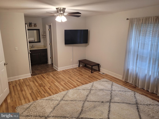 13 Amherst Ct, Bordentown, NJ 08505 - unfurnished bedroom with wood finished floors, baseboards, and ensuite bath