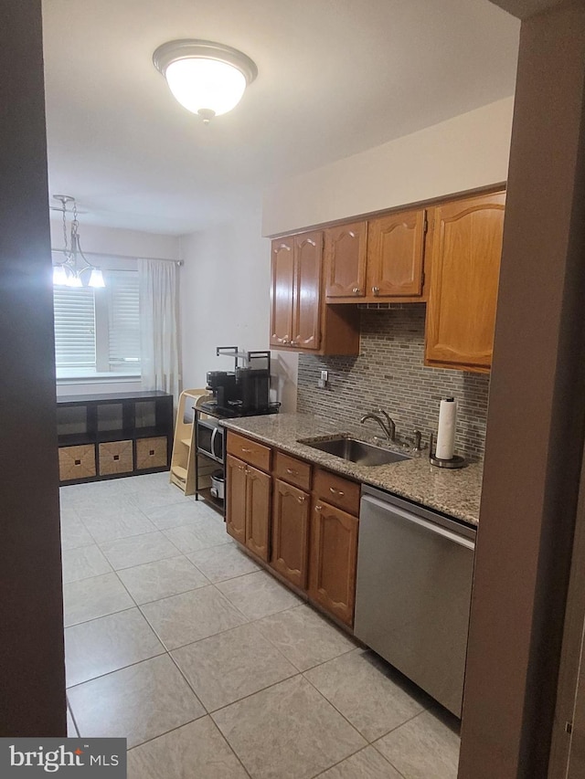 13 Amherst Ct, Bordentown, NJ 08505 - kitchen featuring stainless steel dishwasher, a sink, light tile patterned flooring, and backsplash