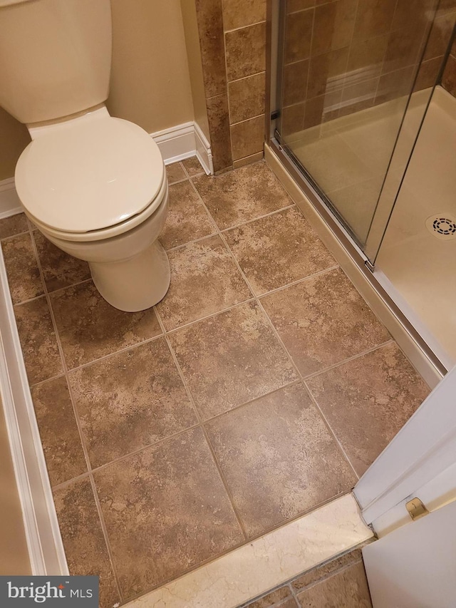 13 Amherst Ct, Bordentown, NJ 08505 - full bathroom with a shower stall, toilet, baseboards, and tile patterned floors