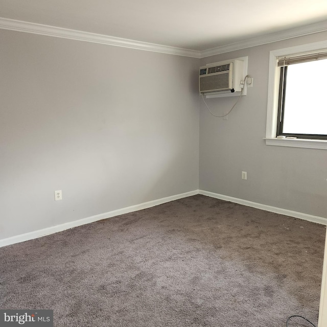 3105 Naylor Rd SE Unit 302, Washington, DC 20020 - carpeted empty room featuring a wall mounted air conditioner, crown molding, and baseboards