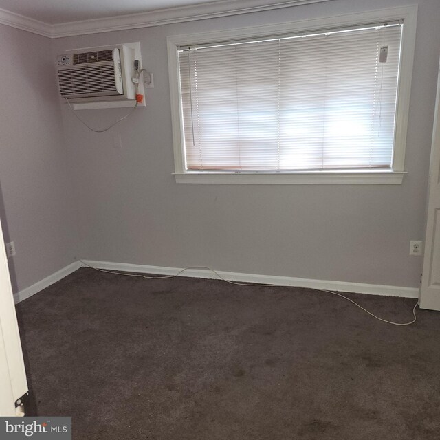 3105 Naylor Rd SE Unit 302, Washington, DC 20020 - carpeted spare room with crown molding, a wall mounted air conditioner, and baseboards
