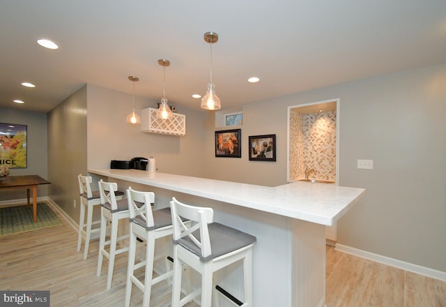 15 Eagle Rd, Phoenixville, PA 19460 - bar area featuring light wood-style floors, recessed lighting, baseboards, and pendant lighting