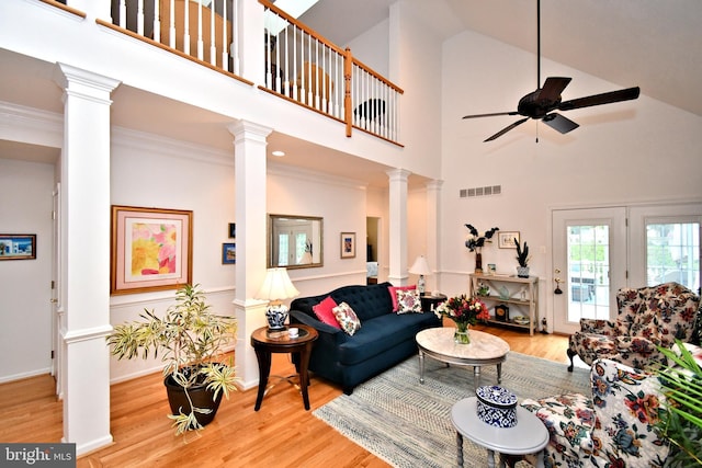 15 Eagle Rd, Phoenixville, PA 19460 - living area with ceiling fan, ornate columns, wood finished floors, high vaulted ceiling, and crown molding