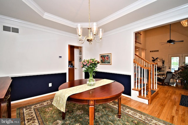 15 Eagle Rd, Phoenixville, PA 19460 - dining room featuring hardwood / wood-style floors, stairs, crown molding, ceiling fan, and a chandelier