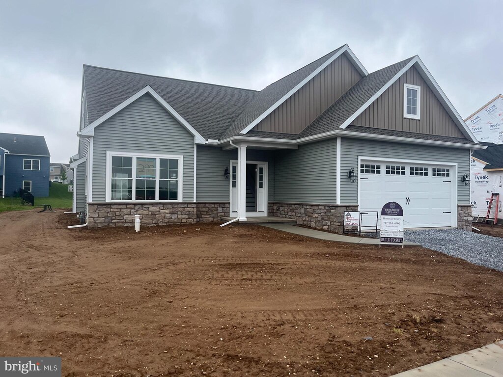 4 Marsh Run, Elizabethtown, PA 17022 - craftsman house with board and batten siding, stone siding, a shingled roof, and a garage