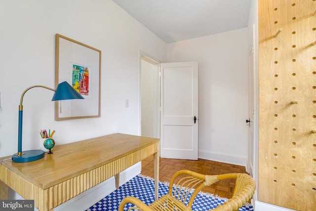 home office featuring baseboards