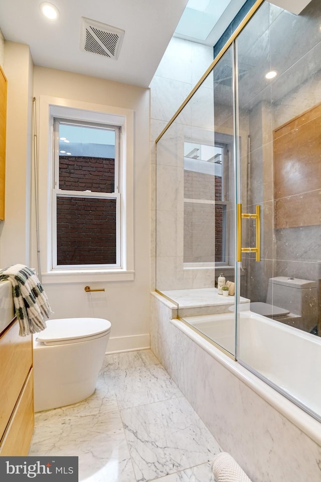 full bath featuring toilet, baseboards, recessed lighting, and marble finish flooring