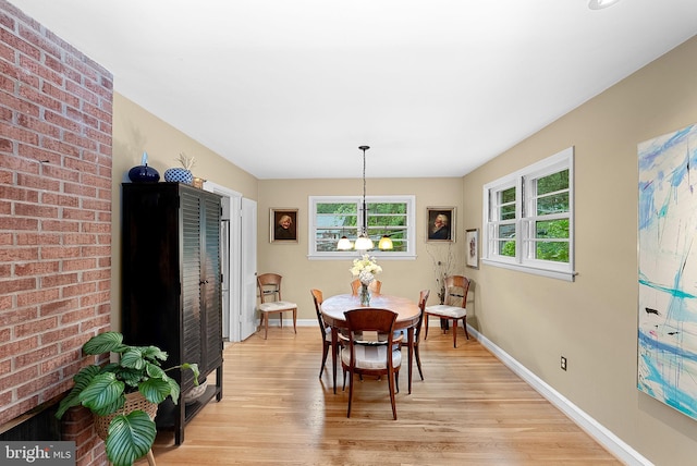 3608 Whispering Ln, Falls Church, VA 22041 - dining room featuring light wood-type flooring and baseboards