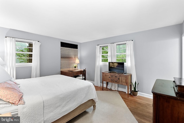 3608 Whispering Ln, Falls Church, VA 22041 - bedroom with baseboards and wood finished floors
