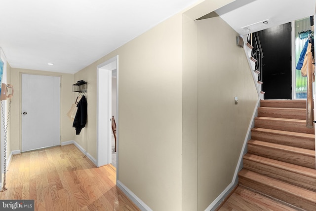 3608 Whispering Ln, Falls Church, VA 22041 - stairway featuring wood finished floors and baseboards