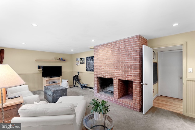 3608 Whispering Ln, Falls Church, VA 22041 - carpeted living area with a fireplace, recessed lighting, and a wainscoted wall