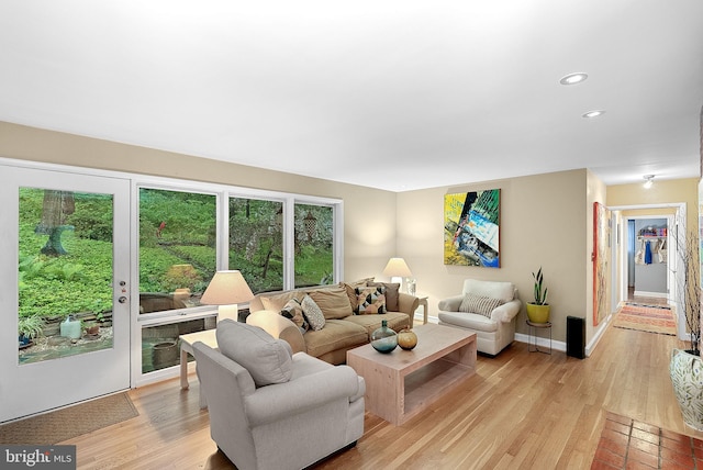 3608 Whispering Ln, Falls Church, VA 22041 - living area with recessed lighting, light wood finished floors, and baseboards