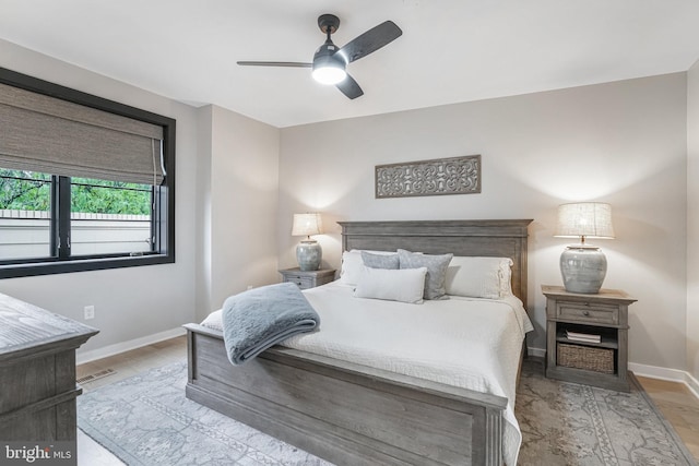 603 N Alfred St, Alexandria, VA 22314 - bedroom featuring baseboards, ceiling fan, and wood finished floors