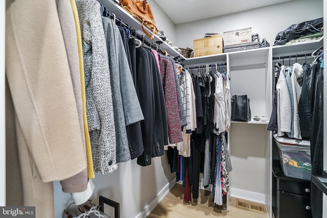 603 N Alfred St, Alexandria, VA 22314 - spacious closet featuring wood finished floors