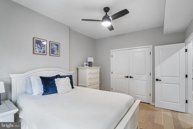 603 N Alfred St, Alexandria, VA 22314 - bedroom with light wood-style floors, a closet, and a ceiling fan