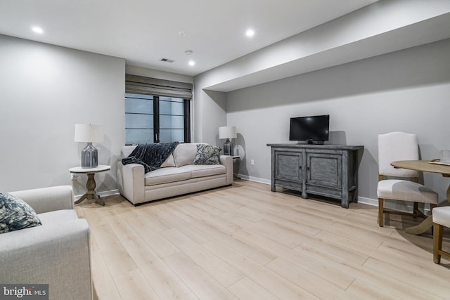 603 N Alfred St, Alexandria, VA 22314 - living room with wood finished floors, recessed lighting, and baseboards