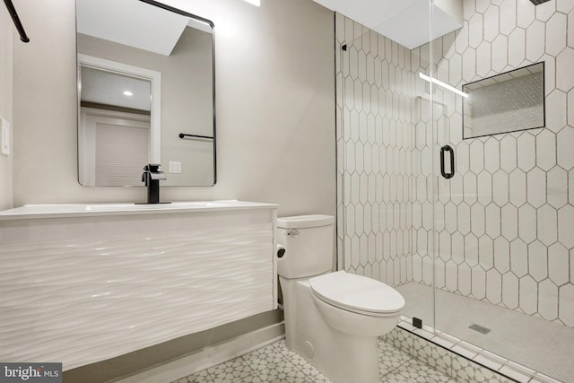 603 N Alfred St, Alexandria, VA 22314 - full bathroom featuring toilet, vanity, and a stall shower