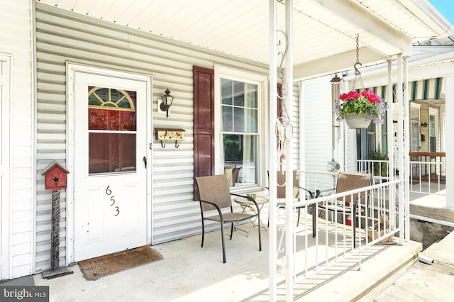 property entrance with a porch