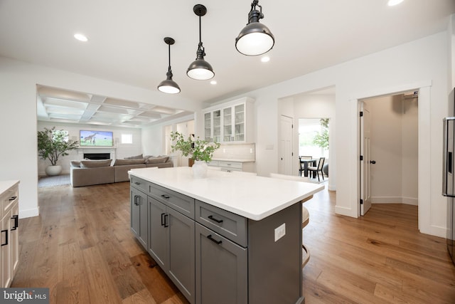 1051 Glen Hall Rd, Kennett Square, PA 19348 - kitchen with gray cabinets, coffered ceiling, light countertops, recessed lighting, and light wood-style flooring
