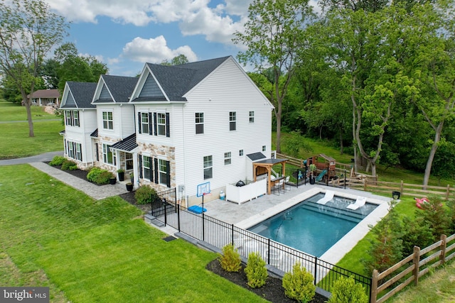 1051 Glen Hall Rd, Kennett Square, PA 19348 - rear view of house featuring stone siding, an outdoor living space, and a shingled roof