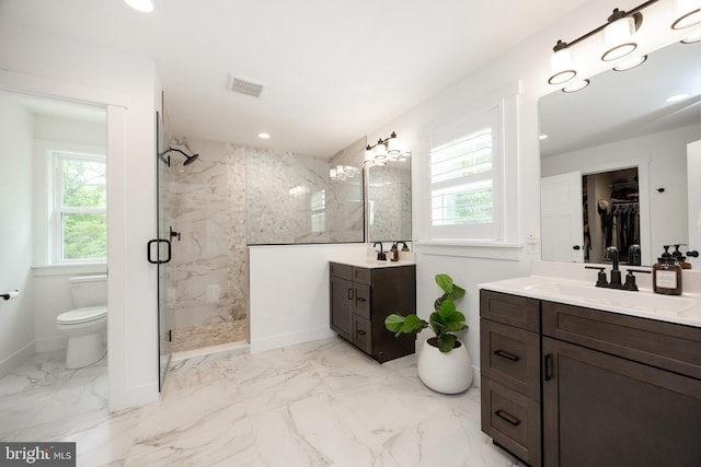 1051 Glen Hall Rd, Kennett Square, PA 19348 - full bathroom featuring a marble finish shower, toilet, plenty of natural light, vanity, and recessed lighting