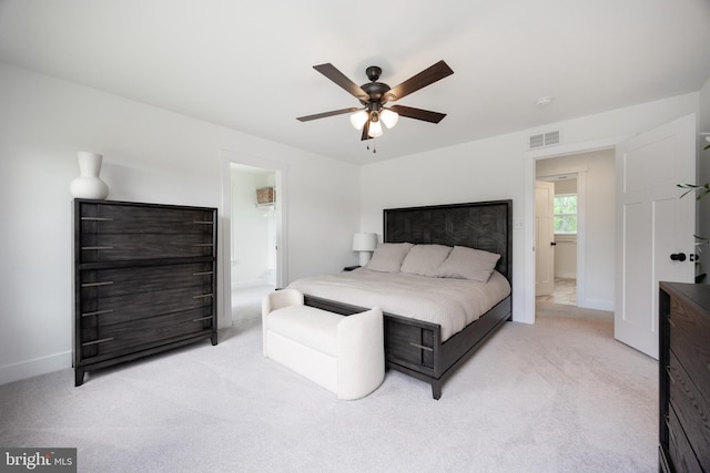 1051 Glen Hall Rd, Kennett Square, PA 19348 - bedroom with light carpet, ceiling fan, baseboards, and ensuite bath