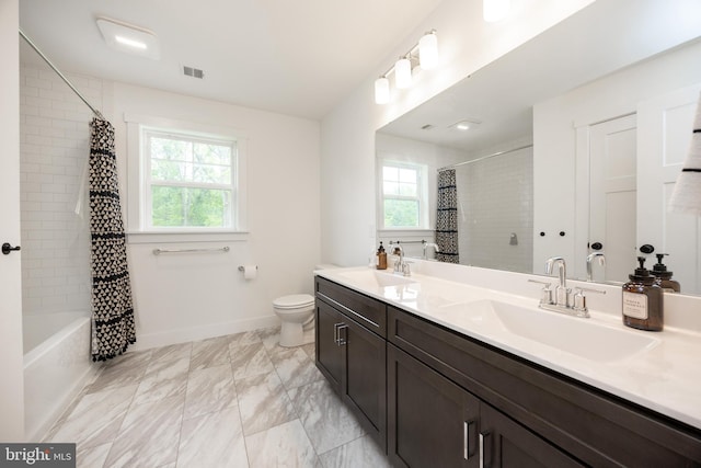 1051 Glen Hall Rd, Kennett Square, PA 19348 - bathroom with double vanity, baseboards, toilet, shower / bath combo, and marble finish floors